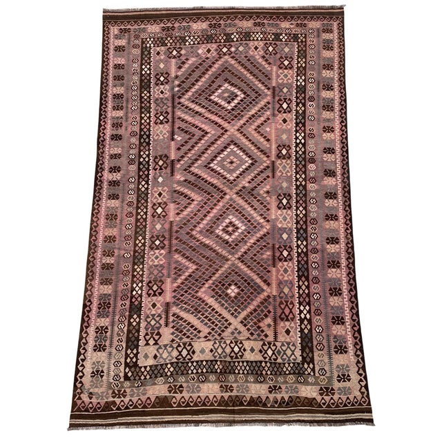 Handwoven Afghan Maimana Ghalmori kilim made from sheep wool. This low-profile flatweave features layered traditional...