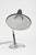 A refined European table lamp. Lamp uses standard bulb and rewired for U.S. use. Lamp is in working condition. Material...