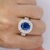GRS Certified 4.73 Carat Blue Sapphire of Ceylon Origin with Pave Set Double Round Cut Diamond Halo. Set in 14K white...