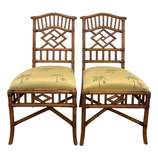 Late 20th Century Pair of Rattan Chippendale-Style Dining Chairs With Fretwork Backs For Sale