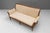 Deconstructed French settee on tapered legs in cherrywood. Circa 1920