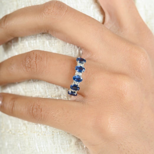 Oval Cut Blue Sapphire Diamond Engagement Band Ring in 18K Gold featuring natural sapphire of 1.76 carats and diamonds of...