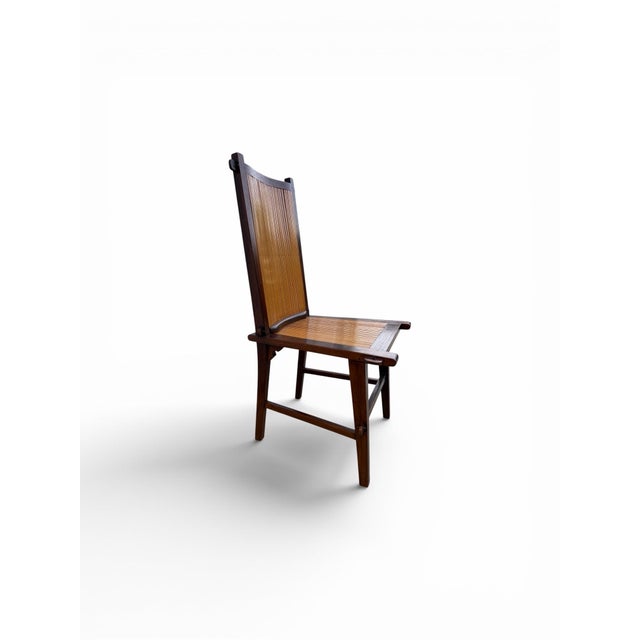 A set of 8 rustic vintage Javanese dinning chairs from the mid 20th century with slatted bamboo back and seat. Created on...