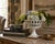 A refined reticulated porcelain basket, executed in a neoclassical idiom with delicate openwork and restrained gilt...