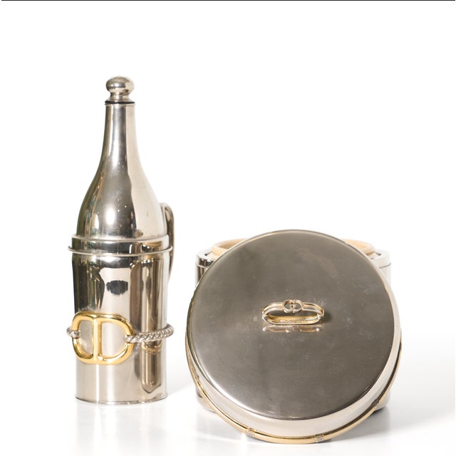 Gucci, Italy, crafted this luxury gold-plated and silvered metal barware bottle holder or bottle decanter and Ice Bucket...