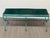 Design Plus Gallery presents a Vintage Hollywood Regency Style Bench. The bench is constructed with a green painted metal...