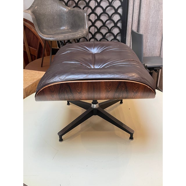 This is a vintage Herman Miller Eames Ottoman in Brown Leather. Original labels intact; 1950-60 era. Lots of patina to the...
