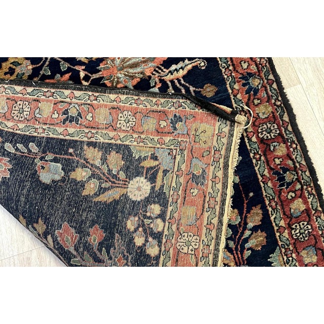 This is an authentic Antique Mahajiran Sarouk, representing the pinnacle of Persian weaving from the turn of the 20th...