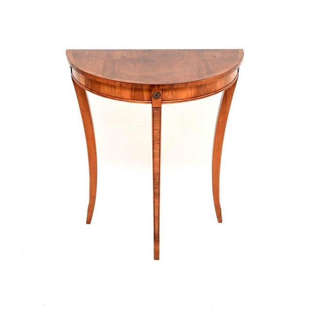 A beautiful and elegant antique Regency style yew wood console table. This was made in England, it dates from around the...