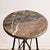 An exclusive pair of Neoclassical-style display stands/coffee tables, attributed to the prestigious Parisian Maison Jansen...