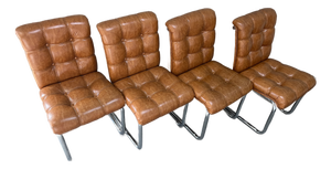 Set of Four Mid-Century Modern Chrome Dining Chairs in the Milo Baughman Style. Circa 1970s.