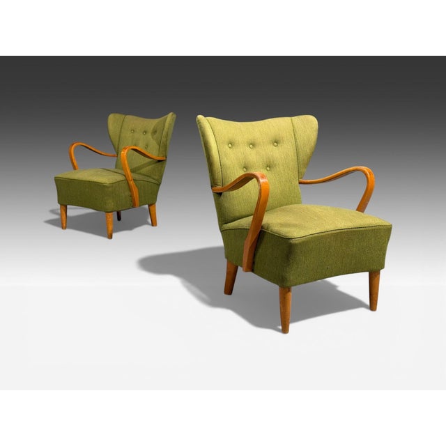 Swedish Mid-Century Modern, Lounge Chairs, Elm, Green Fabric, Sweden, 1930s Pair of green fabric and elmwood ear flap...