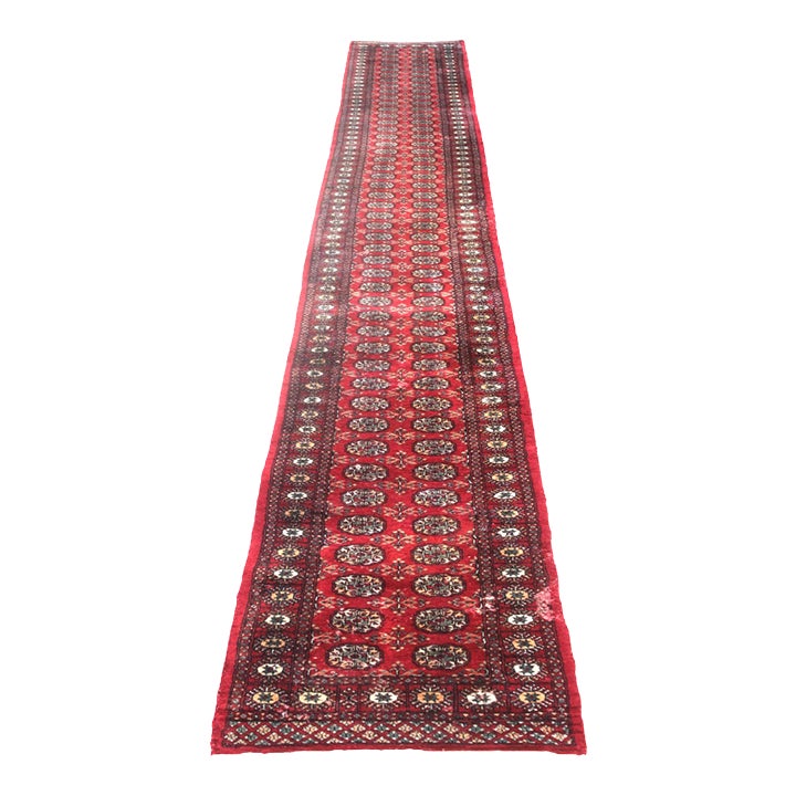 Red Vintage Hand-Knotted Wool Bokhara Runner Rug. 21'x 2'7