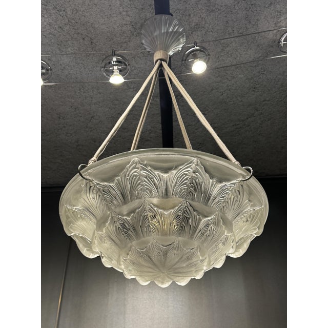 Acanthus Pendant Light by R. Lalique, 1926, in Very Good conditions. Designed 1920 to 1949 This piece has an attribution...