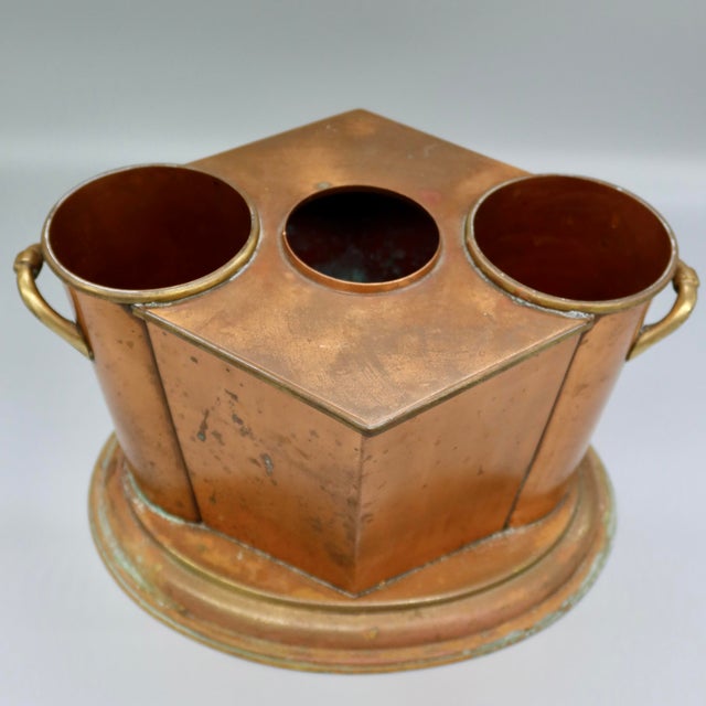 A striking vintage wine cooler in copper with brass trim and twisted ring handles. Each side comfortably fits a standard...