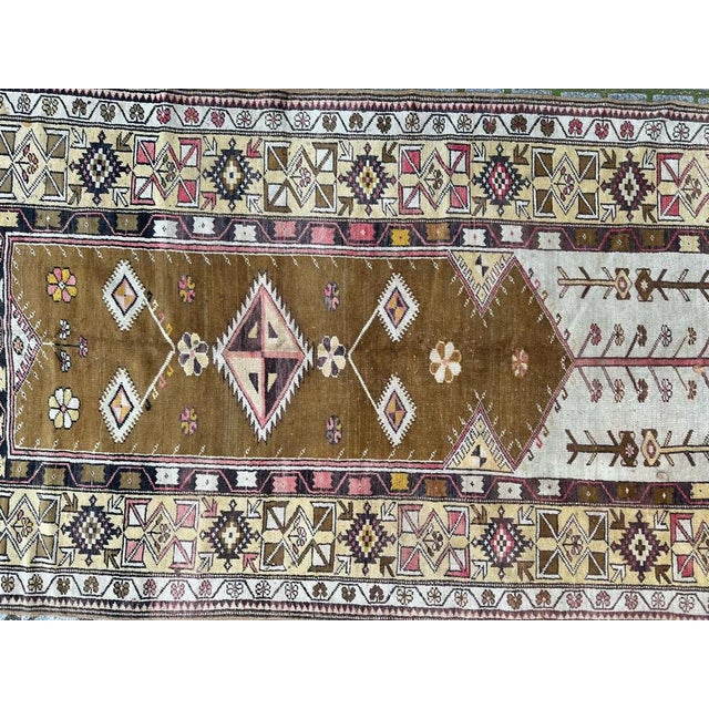 Beautiful mid century Turkish rug with nice geometrical design and beautiful colours with a green and beige field and a...
