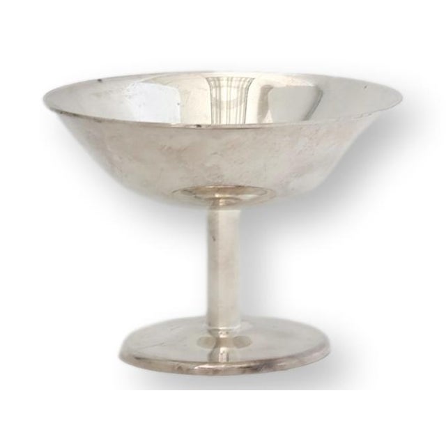 Originally designed for European hotel and café service, this sleek set of WMF silverplate stemmed bowls brings a little...