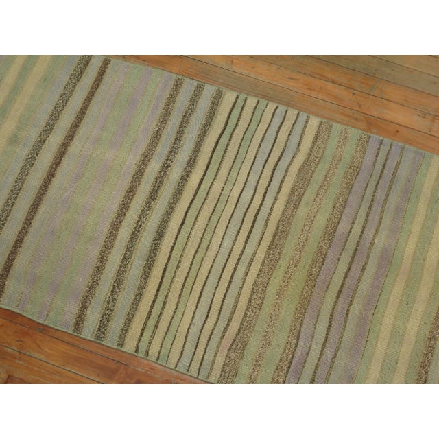 Colorful casual long Kilim runner from the mid-20th century. Mint green, creams, soft blue, lavenders. Measures: 2'5'' x...