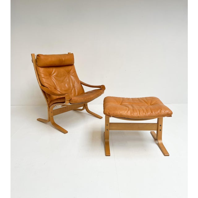 Beautiful Siesta armchair and ottoman by Norwegian Ingmar Relling for Westnofa. Designed in curved, laminated beech and...