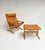 Beautiful Siesta armchair and ottoman by Norwegian Ingmar Relling for Westnofa. Designed in curved, laminated beech and...