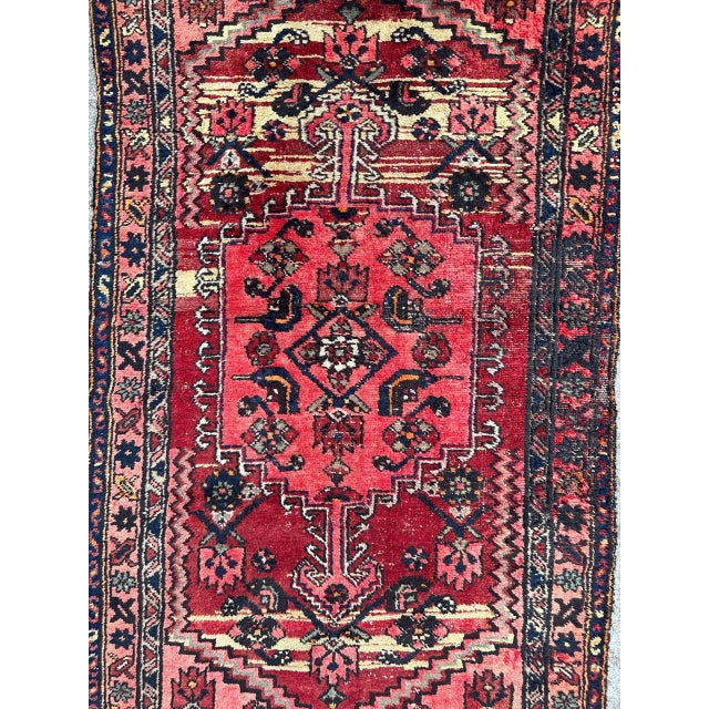 Beautiful mid century Hamadan rug with nice geometrical and tribal design and nice colours with pink, red, yellow, orange,...
