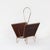 Vintage magazine rack from the 1950s, designed in the distinctive rebellious modern style . The combination of bent brass...