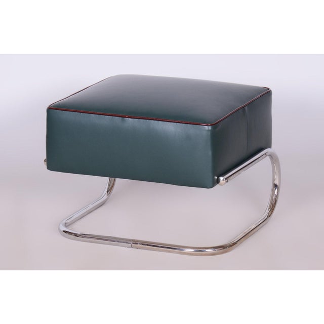 This Bauhaus-style ottoman from the 1930s was produced by Slezákovy závody. It features tubular chromed steel and is...