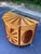 Striking Neoclassical-style demilune cabinet featuring elaborate sunburst marquetry in contrasting warm-toned woods. The...