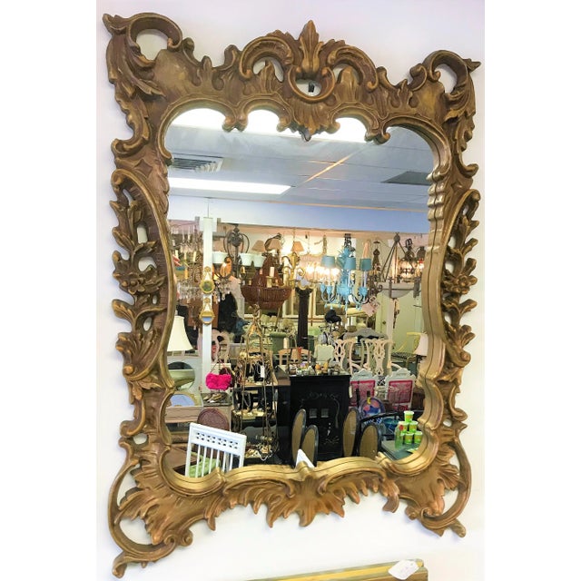 Very cool Rococo style statement mirror! This lightweight mirror is made of rigid polyurethane foam with a painted faux...
