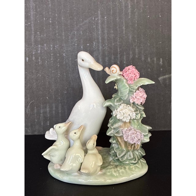 1980s Porcelain "How Do You Do? Duck Figurine From Lladro, Featuring a Mother Duck, Three Ducklings, and a Snail on a Flowering Branch. For Sale - Image 4 of 5