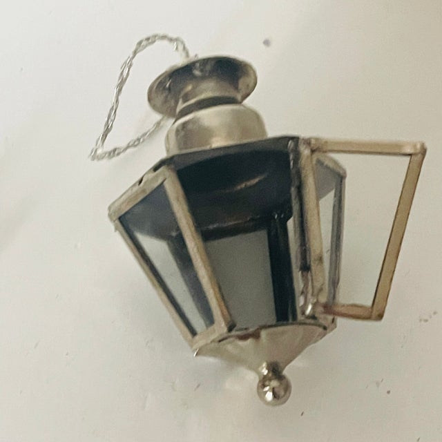 Antique metal lantern Christmas ornament.