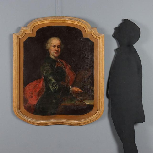 Oil on canvas. Northern Italian School, 18th century. The gentleman, elegantly dressed with a red cape, is portrayed with...