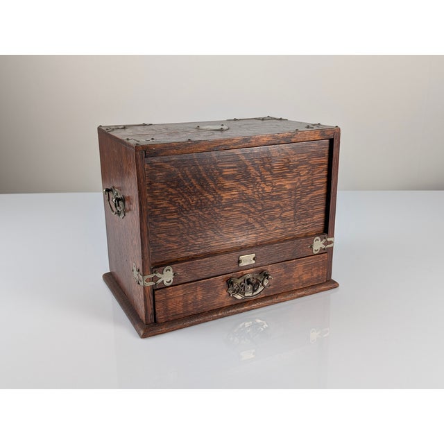 Antique desk-type desk furniture made in England in the 19th century, carved in dark oak wood with marked grains and...