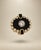 14k yellow gold ring is finished with a hinged shank. The ring is centered with one, bezel set, round, brilliant cut...
