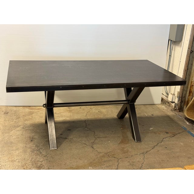 Design Plus Gallery presents a Rectangular Metal Dining Table from Big Daddies Antiques. The table is showcasing a strong...
