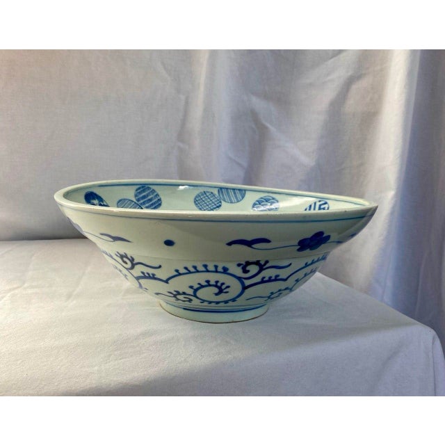 A beautifully sculptural Japanese porcelain “helmet” bowl, attributed to the Hirado kilns (Mikawachi), dating to the late...