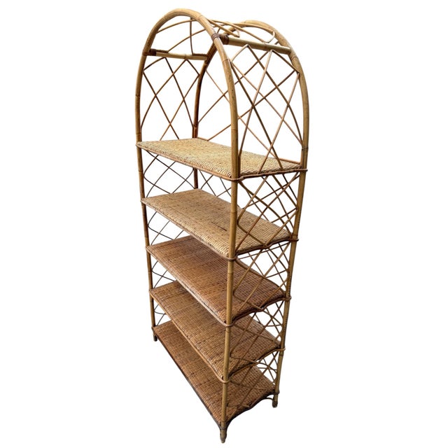 Beautiful rattan shelf from the 1960s. Handcrafted in the south of France.