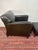 This Bradington-Young leather armchair and matching ottoman is an easy “anchor piece” for a living room, den, or...