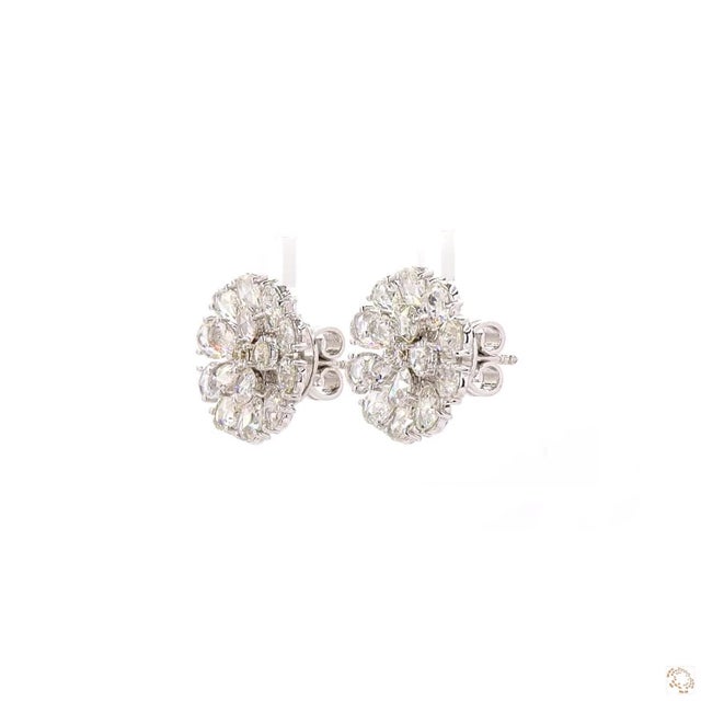 This pair of drop earrings from our contemporary estate collection centers on a 5.74-carat diamond in a rose cut, prized...