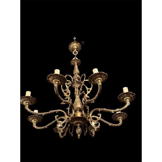 Very beautiful and elegant chandelier in classic french style, crafted in heavy brass/bronze with beautifully detailed...
