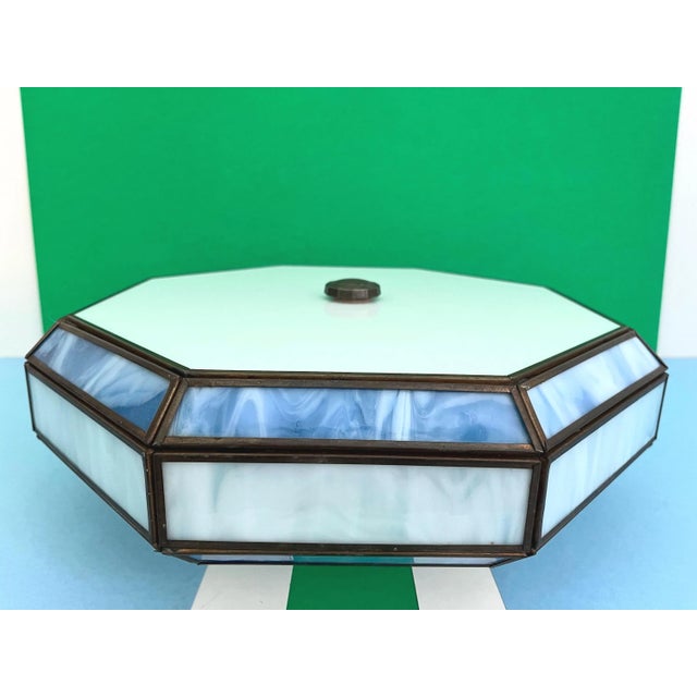 Beautiful mid century Tiffany style stained glass flush mount ceiling light in a sleek layered design of blue and white...