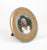 Midcentury wonderful round picture frame in steel, wood, wicker and glass by Tommaso Barbi. Made in Italy in the 1970s....