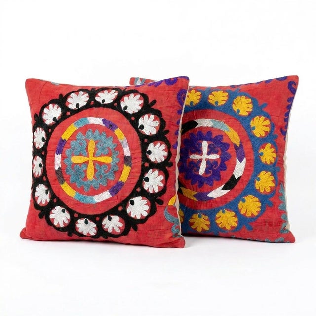This beautiful 20'' x 21'' & 20'' x 22'' hand-embroidered Suzani pillow cover set was made from authentic Uzbek cotton...