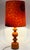 A table lamp * Mid-Century Modern from the 1960s/70s. * Orange-red ceramic base with a typical shape of the era. *...