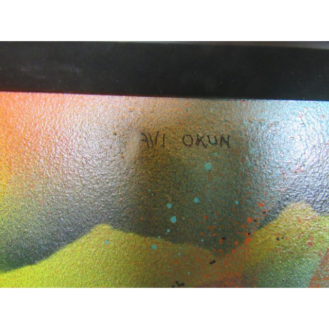 A colorful and spirited abstract painting, framed and signed by the artist. WEAR Minor wear to frame consistent with age...