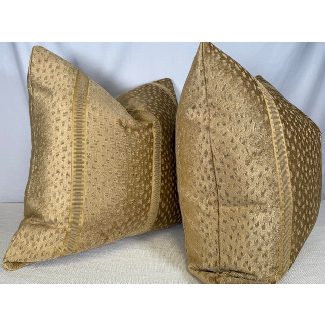 Custom pair of 22" pillows covered in Brunschwig & Fils "Salvator Velvet" in color gold. These pillows have tapered...
