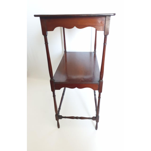 Small solid mahogany console table with original patina. England early 20th century double shelf note: small signs of...