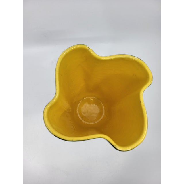 A Poët-Laval handkerchief vase in frosted ceramic with a yellow interior, a typical French model V82 dating from 1950....