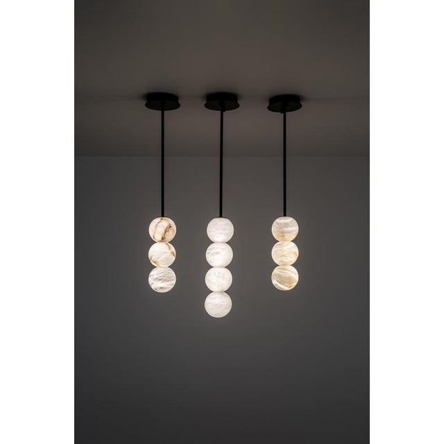 Set of 4 raim pendant lamps by united alabaster dimensions: ⌀ 12 cm each (customizable height) materials: alabaster,...