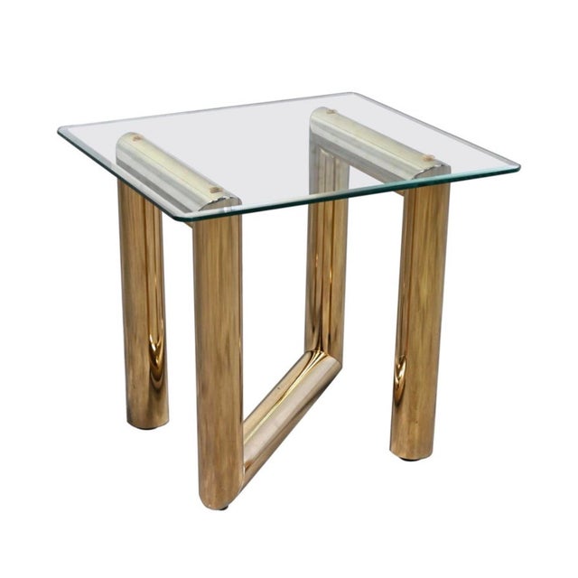 Gorgeous vintage modern brass plated end or side table in the style of Karl Springer. In good vintage condition with some...